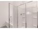 White fiberglass shower with sliding door at 8590 Secretariat Dr, Lithonia, GA 30058