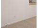 The wall has an electrical outlet and a window view of grass at 8590 Secretariat Dr, Lithonia, GA 30058
