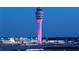 Exterior view of Hartsfield-Jackson Atlanta International Airport and planes on the tarmac at dusk at 4285 Notting Hill Dr # 65, Atlanta, GA 30331