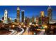 Stunning Atlanta skyline view at night featuring illuminated skyscrapers and the movement of traffic at 4285 Notting Hill Dr # 65, Atlanta, GA 30331