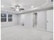 Bedroom with carpet, ceiling fan, window, and closet at 6096 Marigold Way, Atlanta, GA 30349