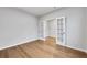 Bright office space featuring hardwood floors and stylish glass French doors at 6096 Marigold Way, Atlanta, GA 30349