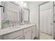 Elegant bathroom with double vanity, decorative mirrors, and walk-in shower at 203 Hubbard Rd, Woodstock, GA 30188