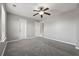 Bedroom featuring neutral walls, carpeted flooring, and an overhead fan at 5253 Rosewood Pl, Fairburn, GA 30213