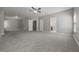 Extensive bedroom featuring wall-to-wall carpeting and multiple doors at 5253 Rosewood Pl, Fairburn, GA 30213