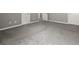 Comfortable bedroom featuring wall-to-wall carpeting at 5253 Rosewood Pl, Fairburn, GA 30213