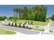 A view of Seabiscuit Road includes 'New Homes' sign, landscaped areas, and several newly constructed houses at 8603 Secretariat Dr, Lithonia, GA 30058