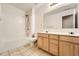 Bathroom featuring a tub/shower combo, toilet, vanity, and tile floors at 4157 Medlock Woods Dr, Snellville, GA 30039