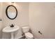 Simple half bathroom with pedestal sink and toilet at 4157 Medlock Woods Dr, Snellville, GA 30039
