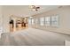 Open-concept living room and kitchen area, perfect for entertaining at 4157 Medlock Woods Dr, Snellville, GA 30039