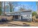 Private backyard with a cozy fire pit and multi-level deck for outdoor enjoyment at 4981 Crowe Se Dr, Smyrna, GA 30082