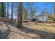 A spacious backyard with a fire pit and wooden fence gives privacy at 4981 Crowe Se Dr, Smyrna, GA 30082