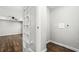 View of a finished hallway with hardwood flooring at 4981 Crowe Se Dr, Smyrna, GA 30082
