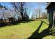 A sprawling green lawn in the backyard area at 1285 Mcclure Nw Ave, Atlanta, GA 30314