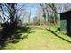 A sprawling green lawn in the backyard area at 1285 Mcclure Nw Ave, Atlanta, GA 30314
