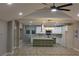 Spacious open-concept kitchen features a large island, stainless steel appliances, and bright white cabinetry at 1285 Mcclure Nw Ave, Atlanta, GA 30314
