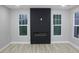 Bright living room featuring a modern fireplace and wood-look flooring at 1285 Mcclure Nw Ave, Atlanta, GA 30314