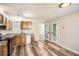 Functional kitchen with wood cabinets, granite countertops, and modern appliances at 1669 Glen Arm Dr, Lithonia, GA 30058