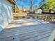 A view of the back deck, overlooking the backyard area and an outbuilding at 2213 Sandtown Sw Rd, Marietta, GA 30060