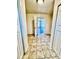 Hallway with tile floors that leads to another room at 2213 Sandtown Sw Rd, Marietta, GA 30060