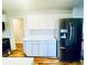 Well-appointed kitchen offering updated cabinets, countertops, stainless appliances, and ample storage at 2213 Sandtown Sw Rd, Marietta, GA 30060