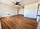 Spacious living room with hardwood floors and a ceiling fan at 2213 Sandtown Sw Rd, Marietta, GA 30060