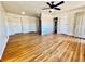 Spacious living room featuring hardwood floors, neutral paint, and ample natural light at 2213 Sandtown Sw Rd, Marietta, GA 30060