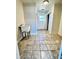 A nice mud room area featuring tile floors, a wash basin, and an exterior door at 2213 Sandtown Sw Rd, Marietta, GA 30060
