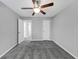 Bright bedroom offering a ceiling fan and a view of the hallway at 5724 Antelope Trl, Atlanta, GA 30349