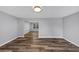 Open-concept living area showcasing wood-look floors and neutral paint at 5724 Antelope Trl, Atlanta, GA 30349