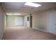 Spacious finished basement with neutral carpet, recessed lighting, and ample room for activities at 4569 Campenille Trce, Suwanee, GA 30024
