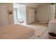 Bedroom includes a hanging chair, rug, soft natural light, and neutral color palette at 4569 Campenille Trce, Suwanee, GA 30024