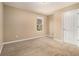 Cozy bedroom with a bright window and neutral walls at , Fairburn, GA 30213