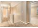 Carpeted hallway leads to bedrooms in this neutrally decorated home at , Fairburn, GA 30213