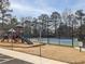 Community playground and tennis courts offer residents access to recreational activities and outdoor fun at 1219 Hadaway Ct, Lawrenceville, GA 30043