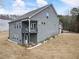 Backyard featuring a multilevel deck on a grey house at 15 Lakeside Way, Cartersville, GA 30121