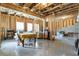 Bright unfinished basement with an open floor plan and painted concrete floor to imagine living space at 15 Lakeside Way, Cartersville, GA 30121