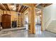 Partially finished basement with open layout, featuring a staircase, wood framing, and potential for various uses at 15 Lakeside Way, Cartersville, GA 30121