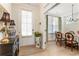 Elegant dining area featuring hardwood floors, a chandelier, and a view of the entryway at 15 Lakeside Way, Cartersville, GA 30121