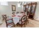 Stylish dining room featuring hardwood floors, a set table, a chandelier, and elegant decor at 15 Lakeside Way, Cartersville, GA 30121