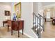 Elegant entryway with hardwood floors, decorative mirror, and stairway access at 15 Lakeside Way, Cartersville, GA 30121