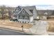 Beautiful two-story home with gray siding, stone accents, and a well-manicured front yard at 15 Lakeside Way, Cartersville, GA 30121