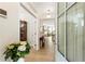 Bright foyer with hardwood floors, decorative flowers, and a view into the adjacent living spaces at 15 Lakeside Way, Cartersville, GA 30121
