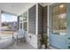 Close-up of the covered front porch showcasing the charming exterior and seating area at 15 Lakeside Way, Cartersville, GA 30121