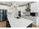 Spacious kitchen featuring a large island with seating and stainless steel appliances at 15 Lakeside Way, Cartersville, GA 30121