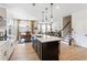 Open kitchen concept with a large island, seamless transition to the dining and living areas at 15 Lakeside Way, Cartersville, GA 30121