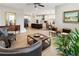 Open-concept living room with hardwood floors, seamlessly connecting to the modern kitchen and dining area, perfect for entertaining at 15 Lakeside Way, Cartersville, GA 30121