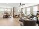 Open concept living room connected to the dining area with hardwood flooring and neutral decor at 15 Lakeside Way, Cartersville, GA 30121