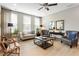 Bright living room with hardwood floors, neutral furniture, and abundant natural light at 15 Lakeside Way, Cartersville, GA 30121