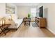 Comfortable loft area featuring hardwood floors, a sofa, a media center, and natural light at 15 Lakeside Way, Cartersville, GA 30121